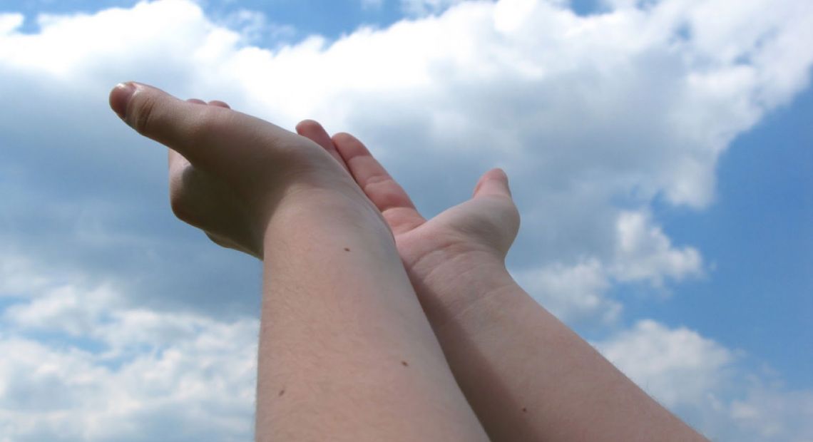 giving-hands-to-sky.jpg